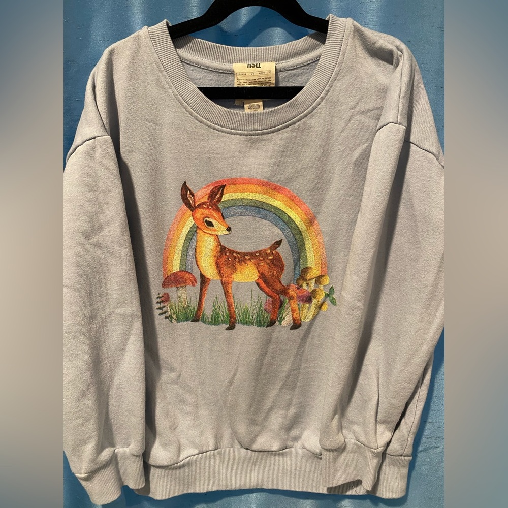 Light blue girls sweatshirt with Bambi / baby deer rainbow graphic. Size XL.